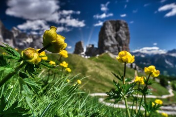 Scenic shot of rocky Dolomitic Mountains in Italy with a cloudscape in the background