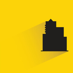 silhouette city building with shadow on yellow background