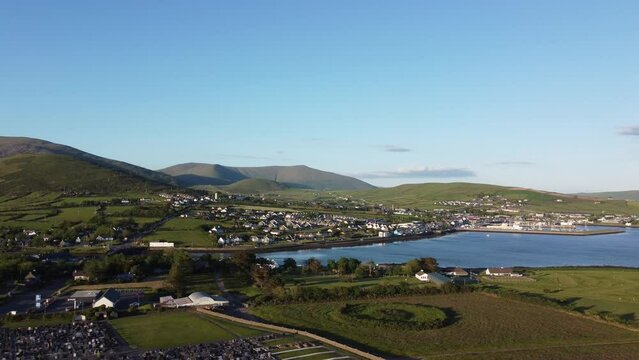 Aerial view of green agricultural fields in Ireland on a sunny morning