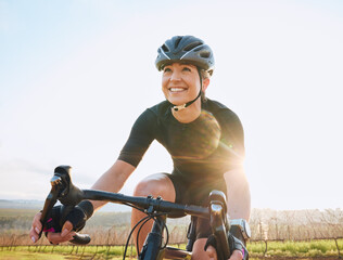 Cycling, fitness and happy with woman in park for training, workout and cardio health. Exercise, travel and freedom with female cyclist riding on bike in nature for adventure, journey and transport - Powered by Adobe