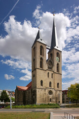 Fototapeta na wymiar Gothic St. Martini church with bell towers in the old town of Halberstadt, Sachsen-Anhalt in Germany