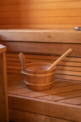 Fototapeta na wymiar Wooden sauna backet with handle