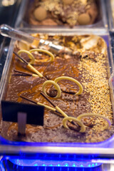 Chocolate ice cream in a showcase. Lots of nice ice cream.