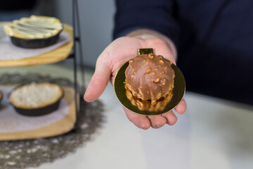 Chocolate round cake on hand