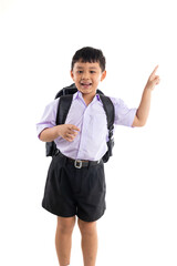 Excited wow fingle point up and side. Thai school uniform with backpack bag. Portrait Young Asian cute boy standing on white background banner. Back to school.