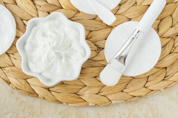 White facial mask (face cream, hair treatment, body butter) with algae extract and make-up brush....