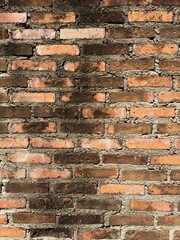 old red and black brick wall with cement texture background