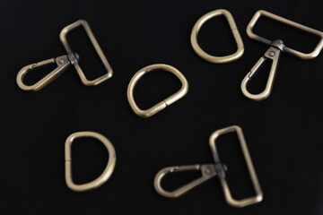 sewing accessories on black fabric background