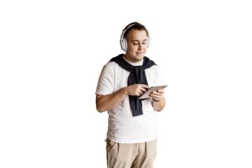 Student guy uses tablet to surf the internet, transparent background.