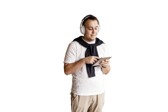 Student guy uses tablet to surf the internet, transparent background.