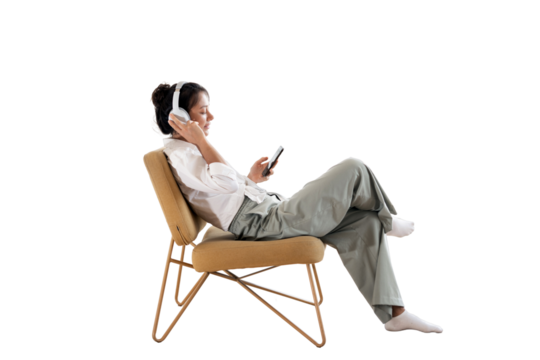 Listening to an audiobook playlist, a woman is resting on a chair using wireless headphones and an app in her phone, transparent background, isolated.