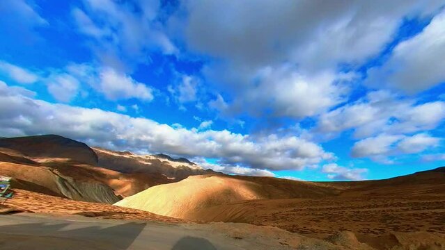 Driving through the Scenic Himalayan Mountains on a Sunny Morning