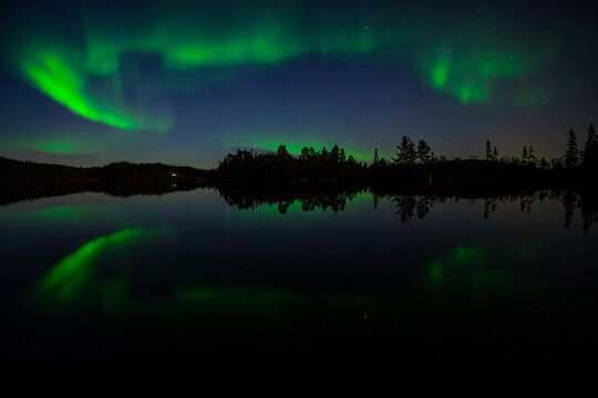 Aurora by the lake