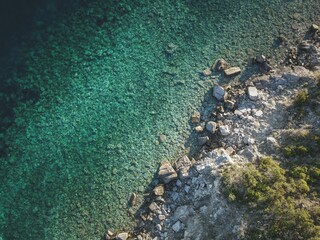 Fototapeta premium Top view of a rocky tropical coast