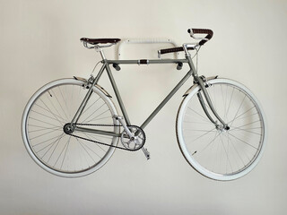 Fototapeta na wymiar Custom made bicycle hanging on a wall