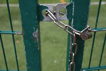 Fence with locked silver chain