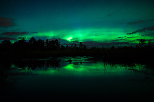 Aurora dancing on the lake