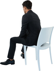 Rear view of businessman sitting on chair
