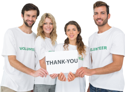 Portrait of happy volunteers holding thank you board