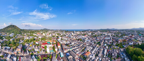Fototapeta premium Phuket city Thailand on March 2023, Aerial view drone photography High angle view of Phuket city, Phuket province Thailand, Panorama of phuket city thailand in sunset or sunrise sky background
