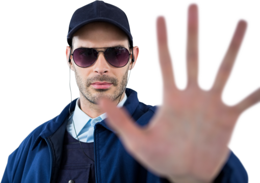 Confident security officer showing stop gesture - Powered by Adobe