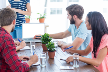 Business team using a laptop 