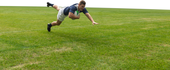Male rugby player scoring a touchdown 