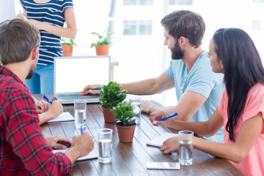 Business team using a laptop 