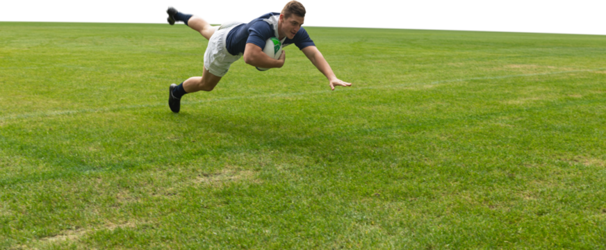 Male rugby player scoring a touchdown 