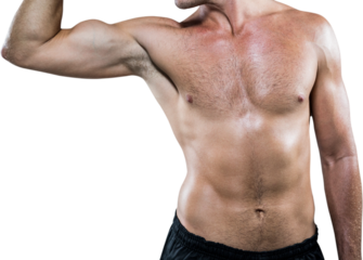 Midsection of shirtless athlete flexing muscles