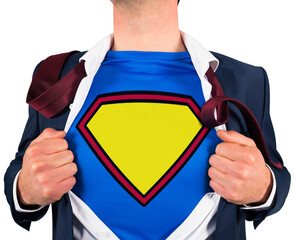 Businessman opening shirt in superhero style