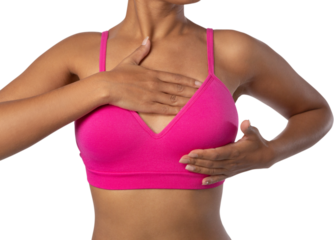 Woman standing for breast cancer awareness against white background