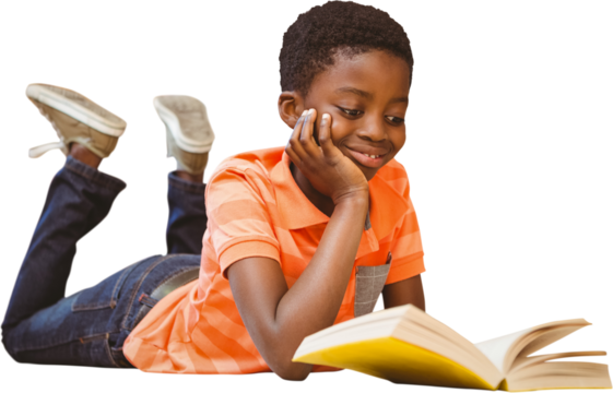 Cute boy reading book in library