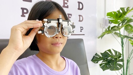 Kid wearing glasses, kid eye test 
