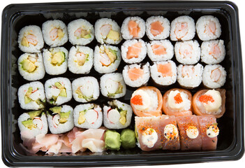 Close up of japanese food platter against white background