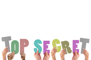 Cropped hands holding colorful alphabets forming top secret