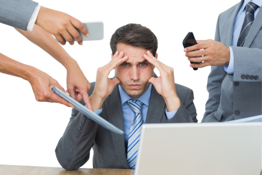 Upset businessman with headache surrounded by team