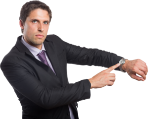 Portrait of serious businessman showing wristwatch
