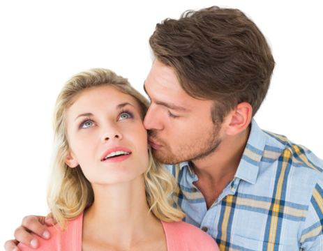 Handsome man kissing girlfriend on cheek