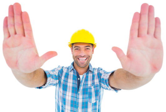 Smiling manual worker gesturing stop sign - Powered by Adobe