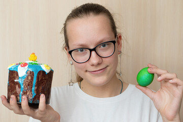 Portrait of a girl with Easter cake. Easter holidays