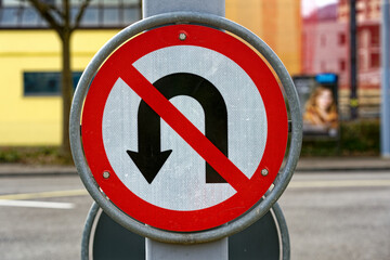 Close-up of traffic sign u turn prohibited on a cloudy winter day at City of Z&uuml;rich district Schwamendingen. Photo taken February 17th, 2023, Zurich, Switzerland.
