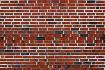 Close-up of red brick wall of industrial building on a cloudy winter day. Photo taken February 17th, 2023, Wallisellen, Switzerland.