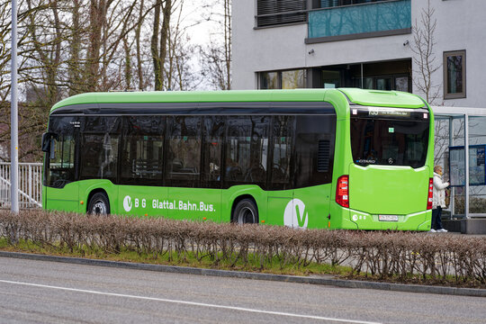 Green bus line 759 of public transport company VBG at City of Z&uuml;rich district Schwamendingen on a cloudy winter day. Photo taken February 17th, 2023, Zurich, Switzerland.