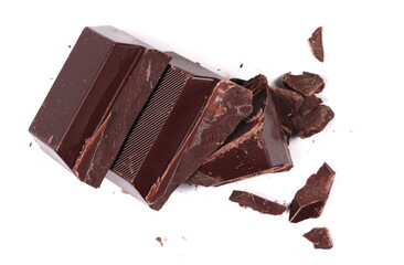 Chopped dark chocolate isolated on white, top view 