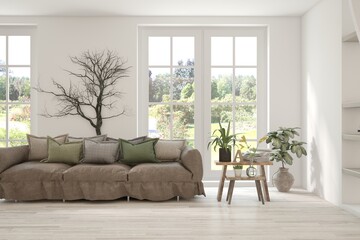 Fototapeta premium Bright interior design with modern furniture and summer landscape in window. 3D illustration