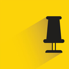 bedside lamp with shadow on yellow background