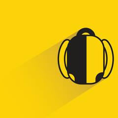 backpack with shadow on yellow background
