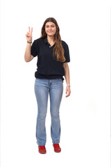 Obraz premium front view of young girl showing two fingers on white background