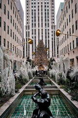 Fototapeta premium Vertical shot of the Rockefeller Center with decorations and the Christmas tree in the background
